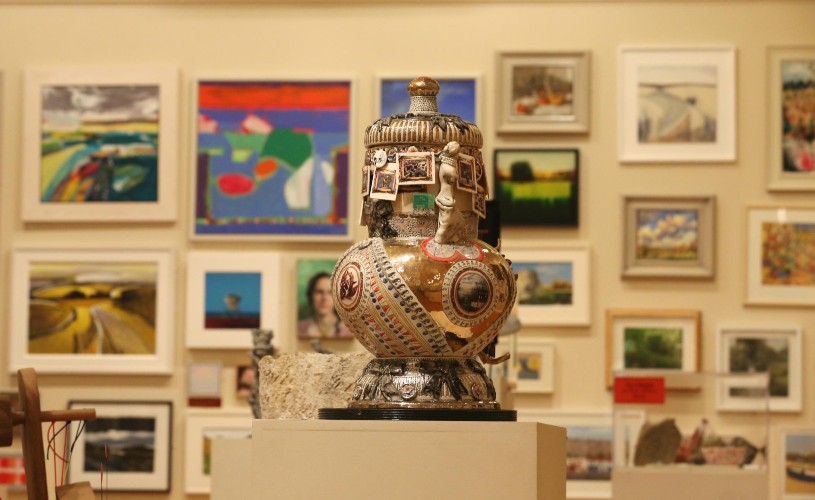 Vase and artwork on display at Victoria Art Gallery